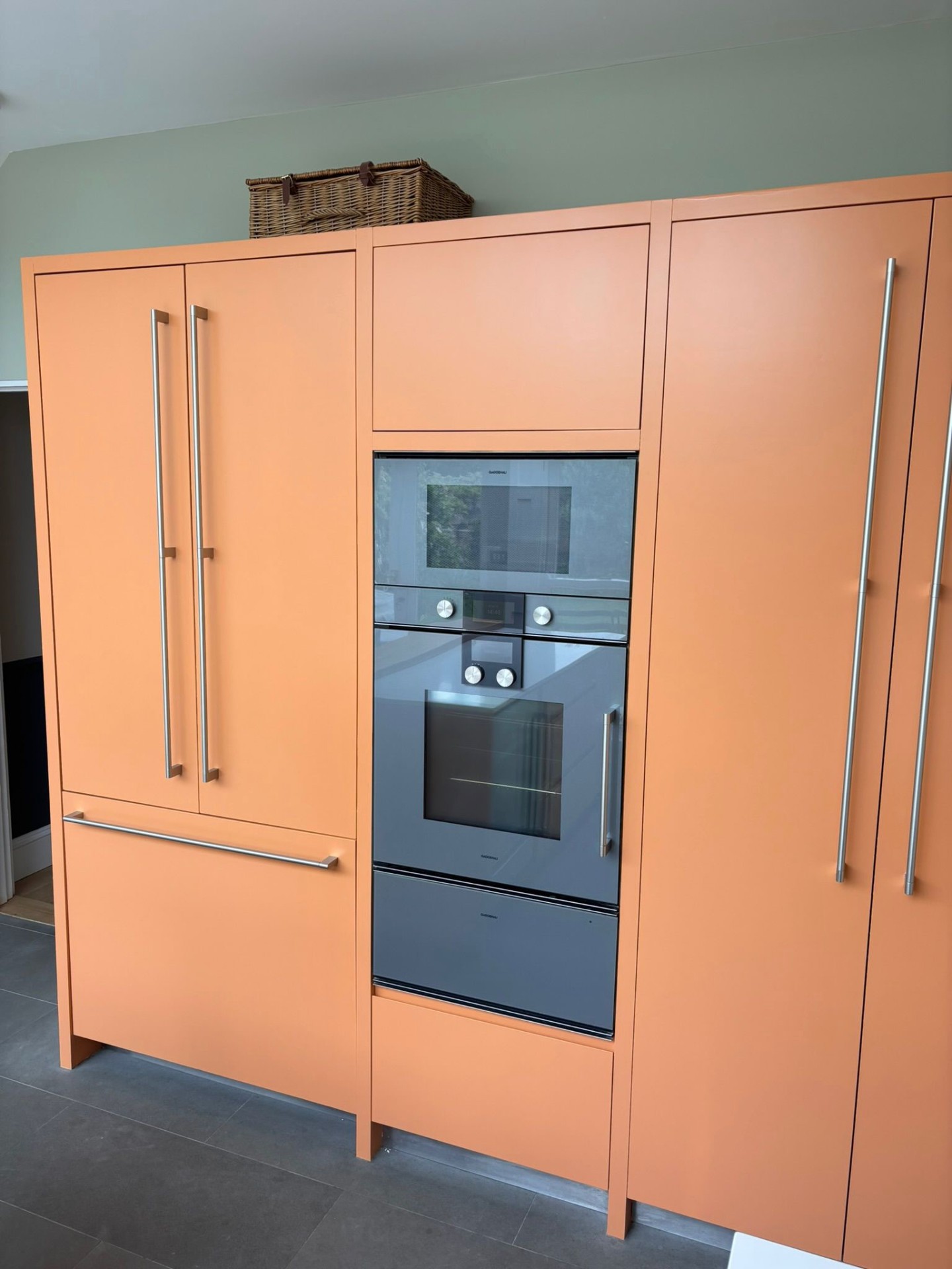 Orange tall kitchen unit spray finish